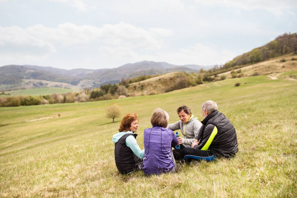 older athletes talking after team sports